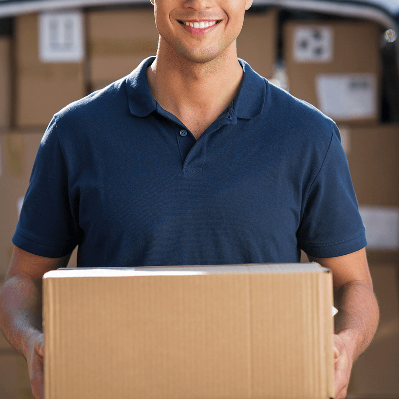 man reviewing delivery boxes